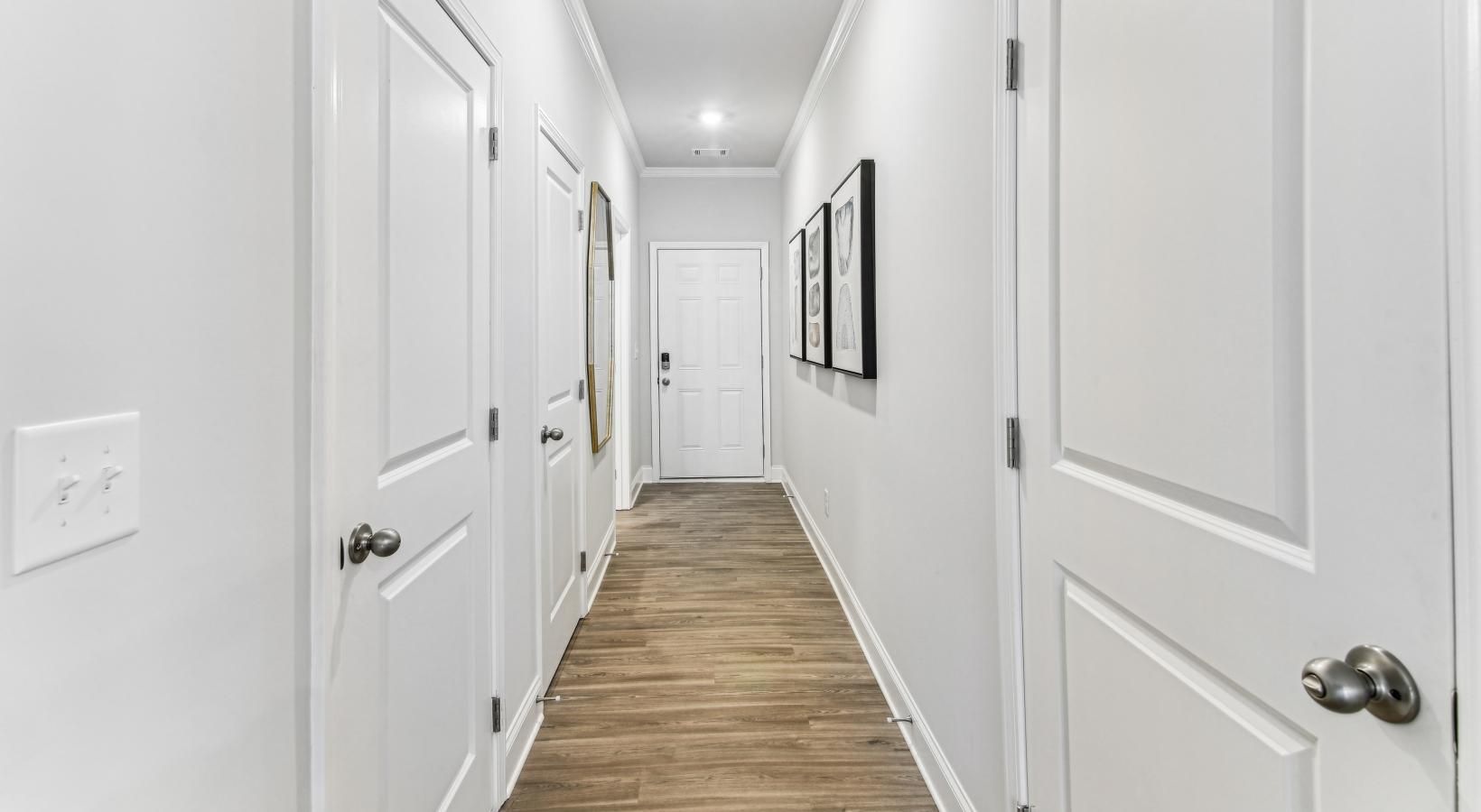 Find your perfect fit at Residences at Bridgestone a hallway with white doors