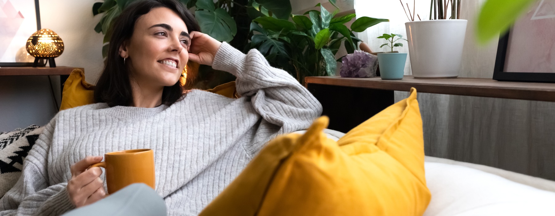 woman enjoying a cup of coffee