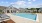 swimming pool with lounge seating