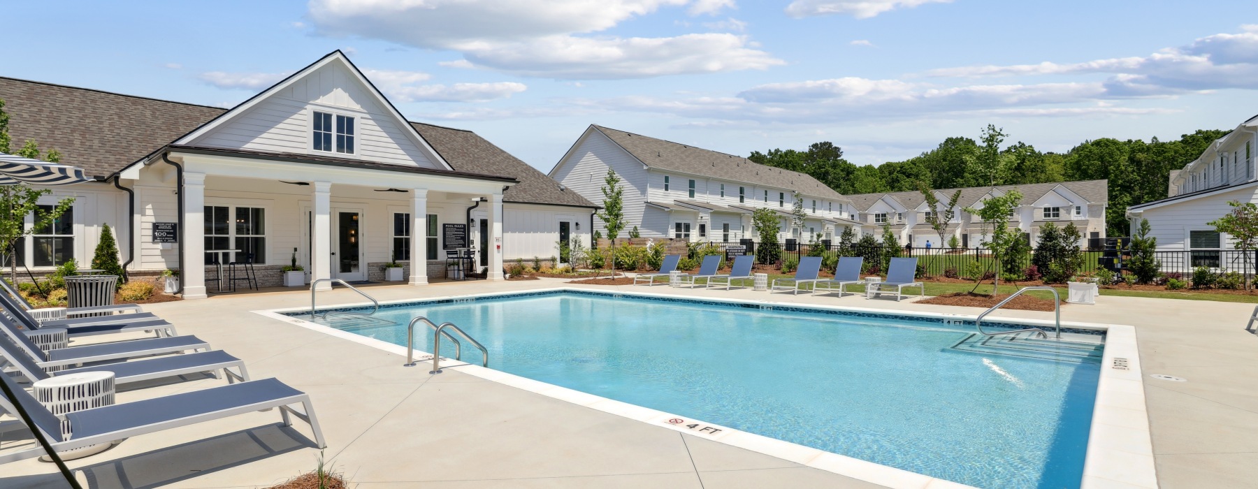 swimming pool with deck seating