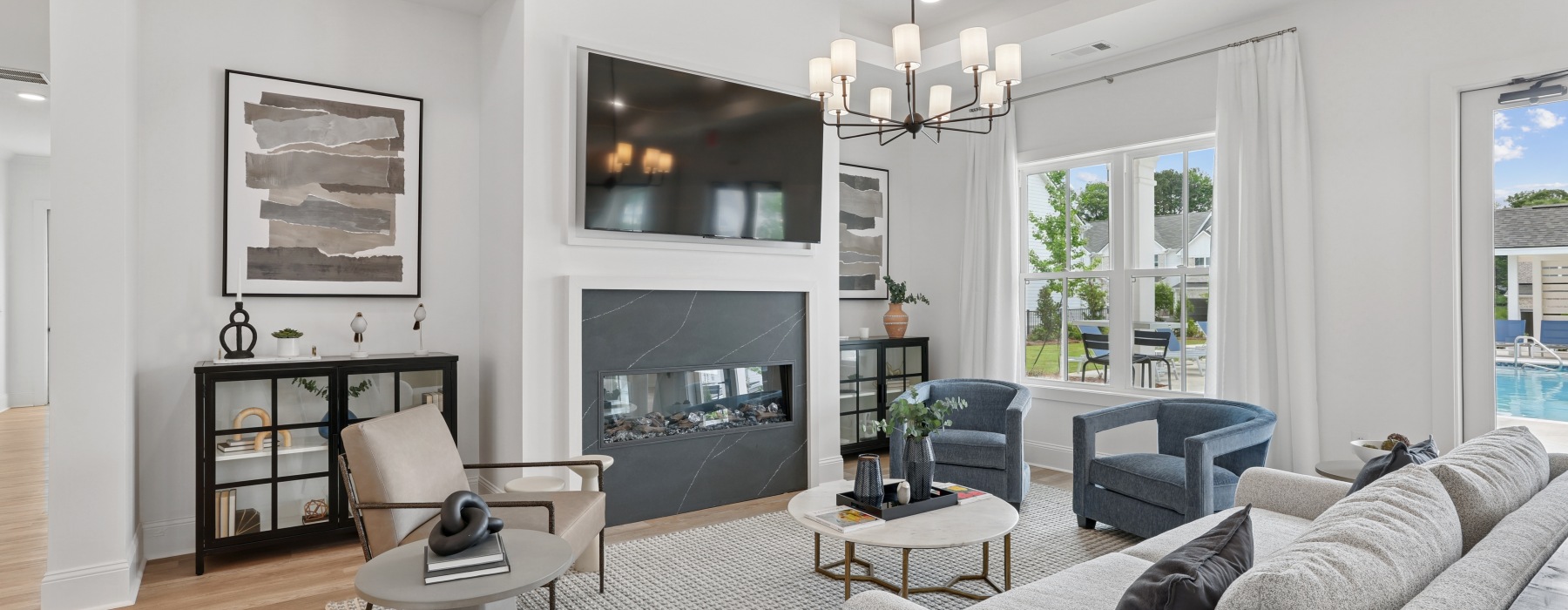 clubhouse with lounge seating and fireplace