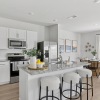 spacious kitchen with granite countertops and stainless steel appliances