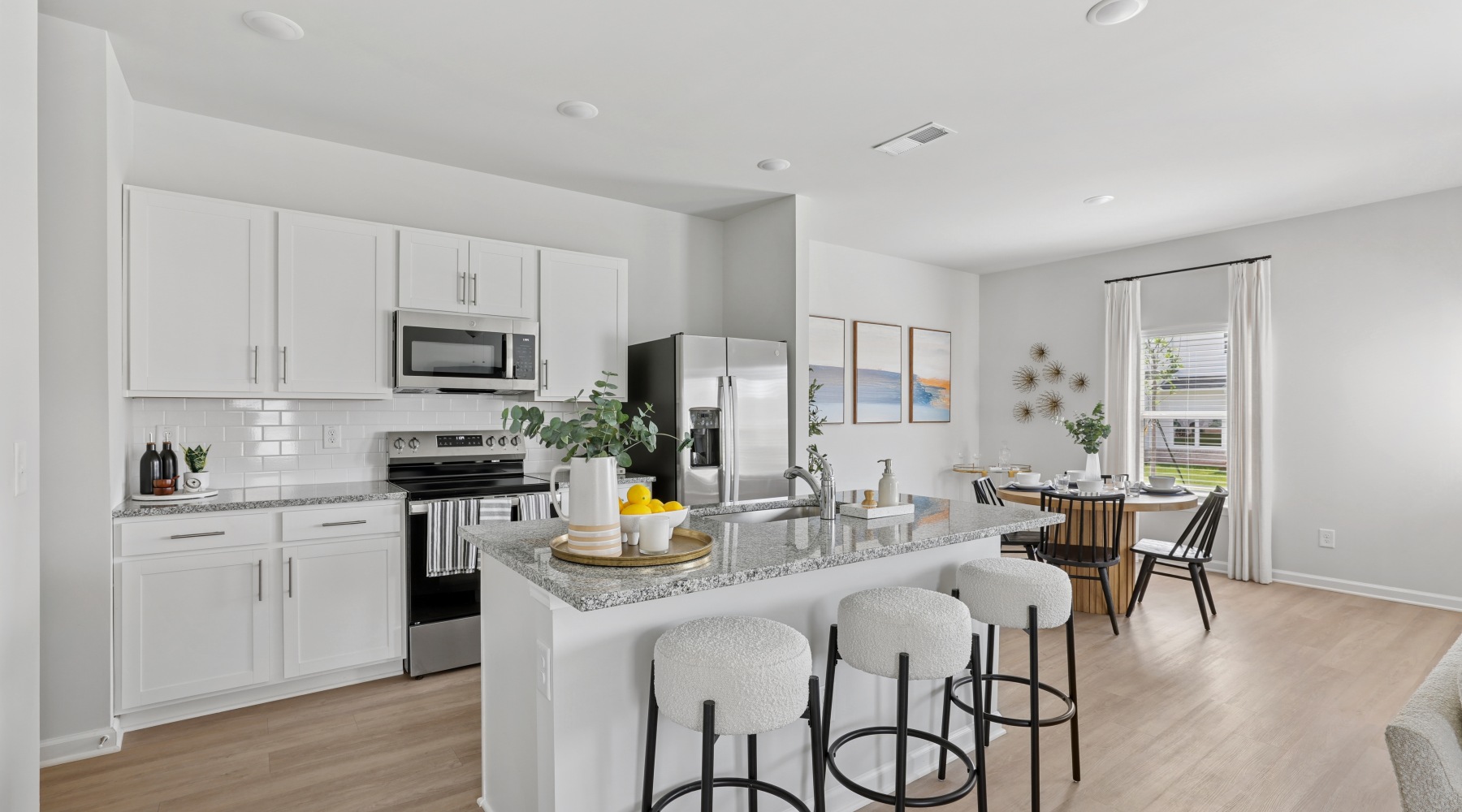 spacious kitchen with granite countertops and stainless steel appliances spacious kitchen with granite countertops and stainless steel appliances