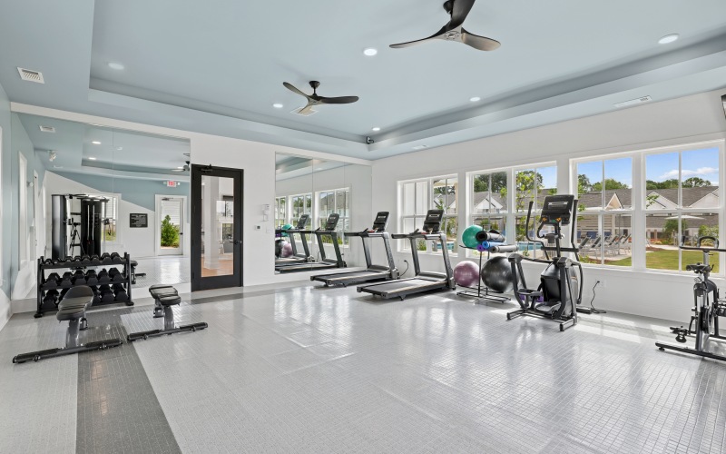 fitness center with cardio equipment