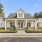 a white building with a driveway